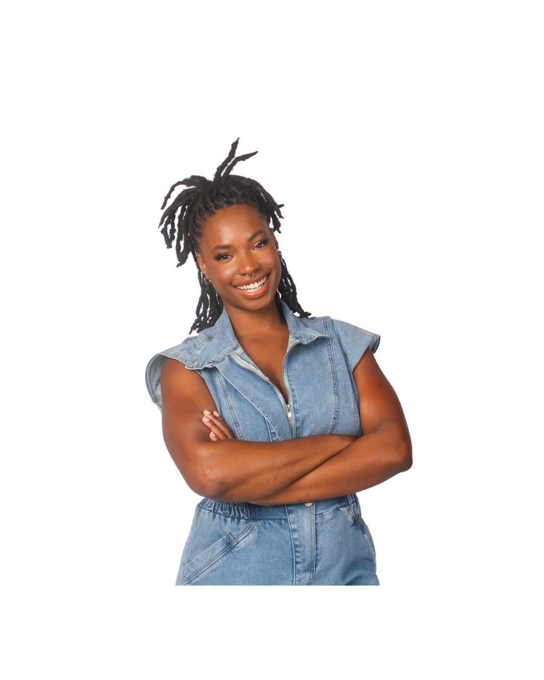 Founder of Enlighten Minds, smiling with arms crossed